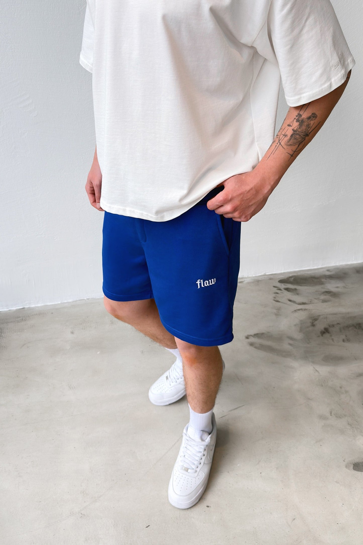 Flaw Embroidered Elastic Waist Shorts