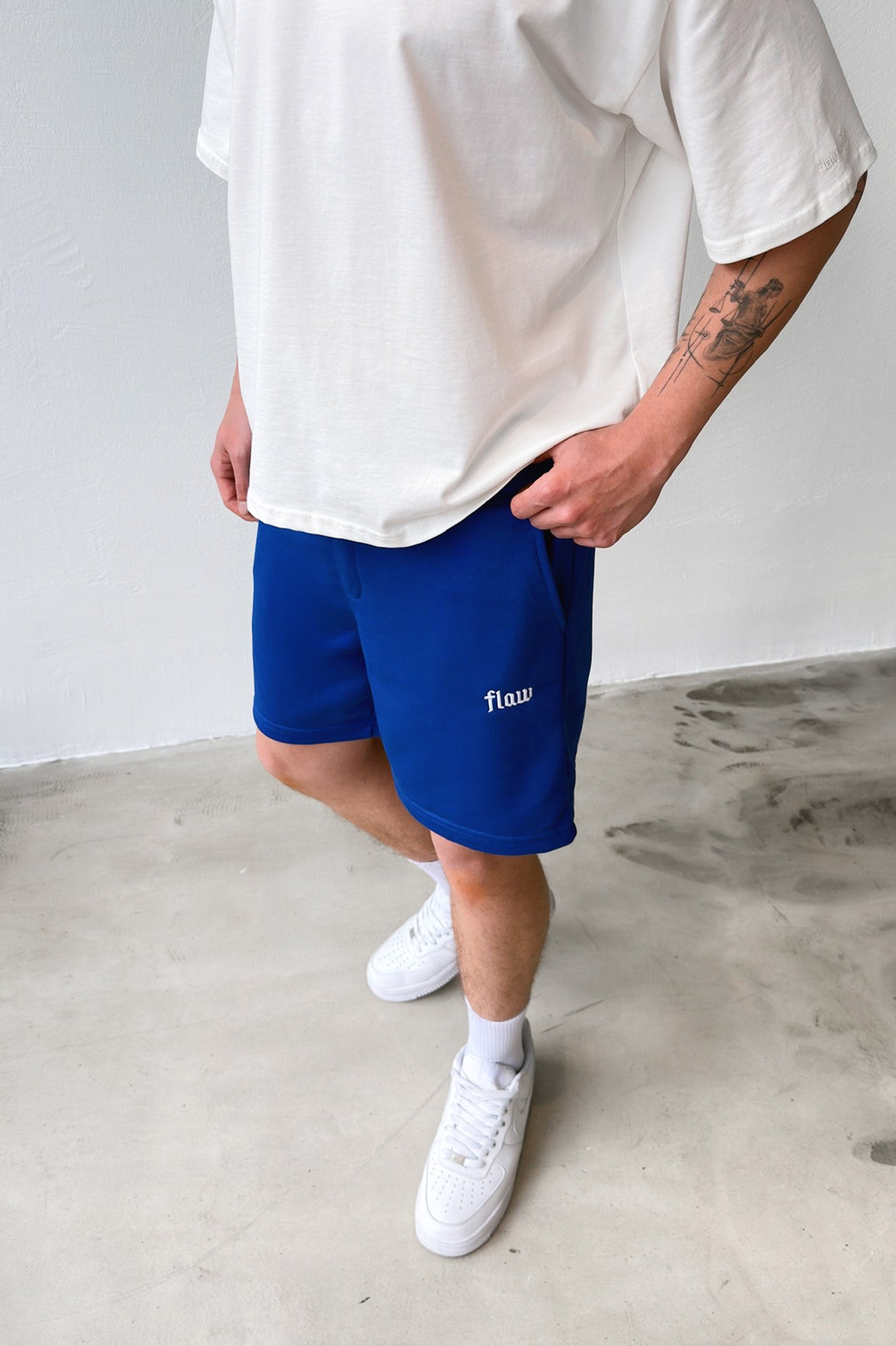 Flaw Embroidered Elastic Waist Shorts