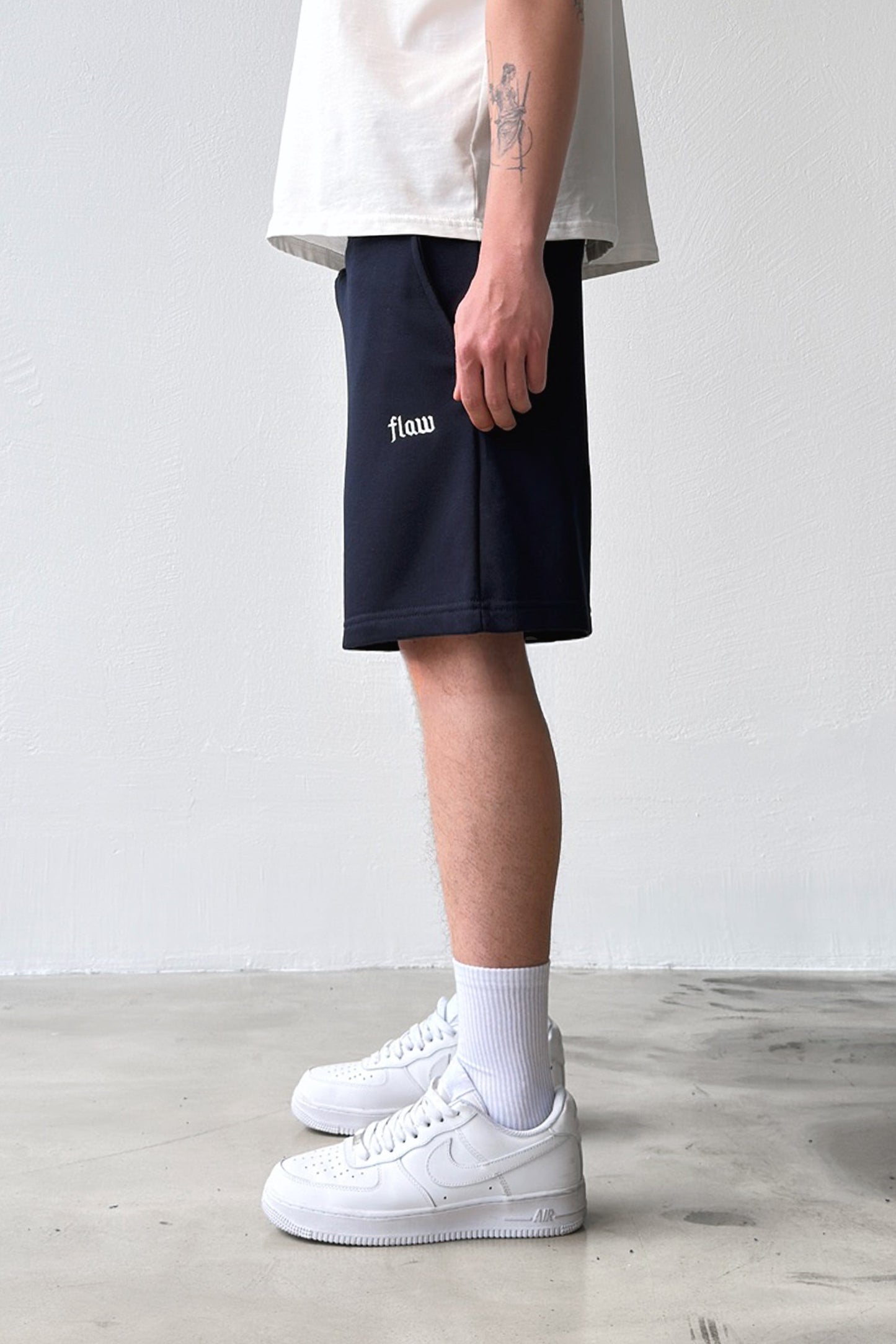 Flaw Embroidered Elastic Waist Shorts