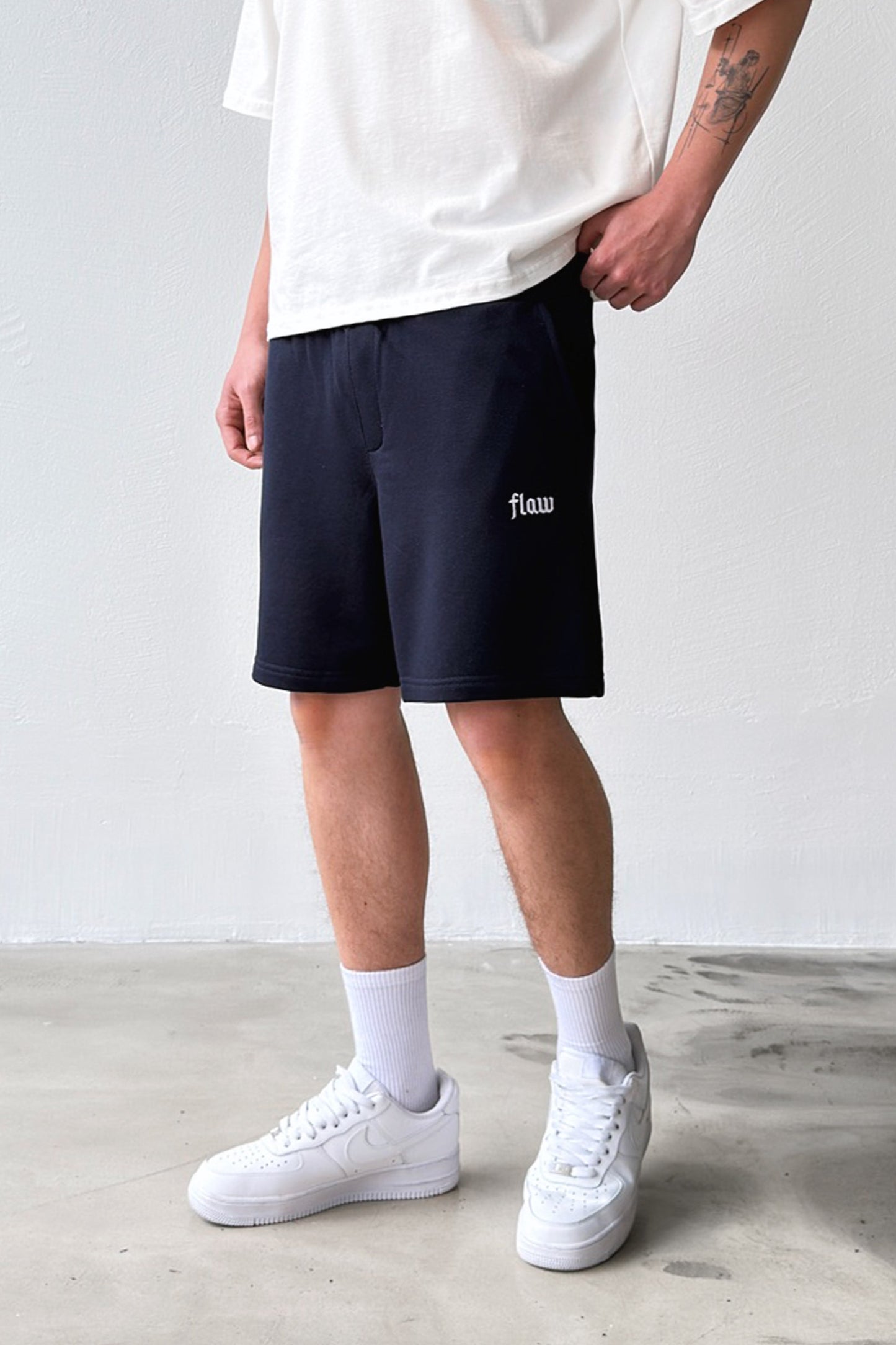 Flaw Embroidered Elastic Waist Shorts