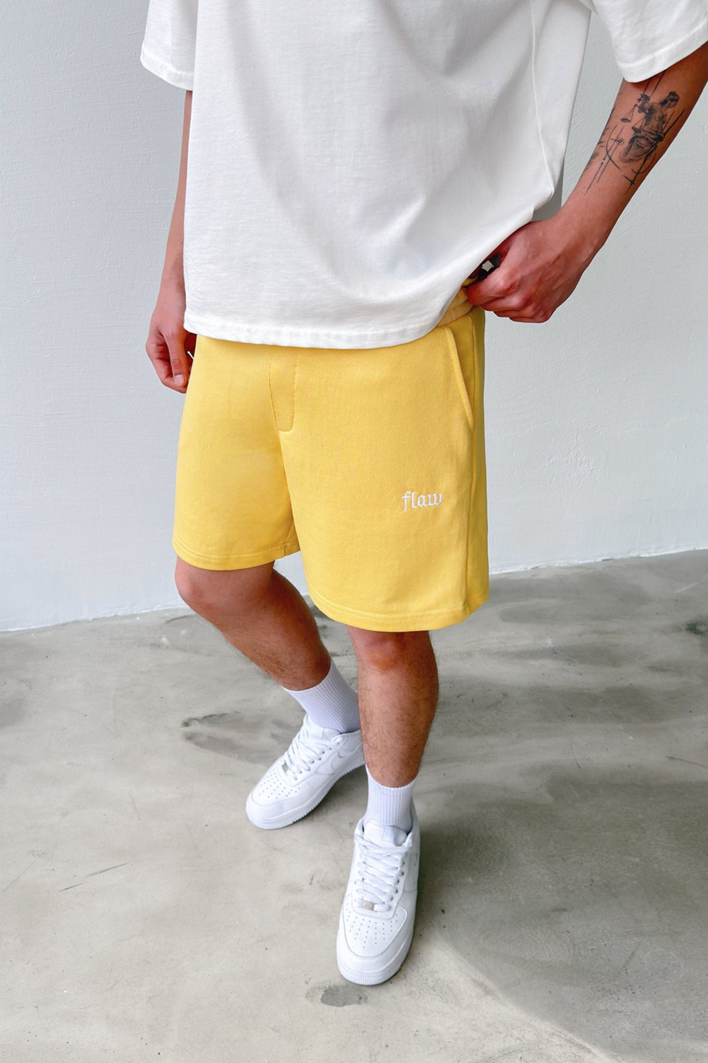 Flaw Embroidered Elastic Waist Shorts