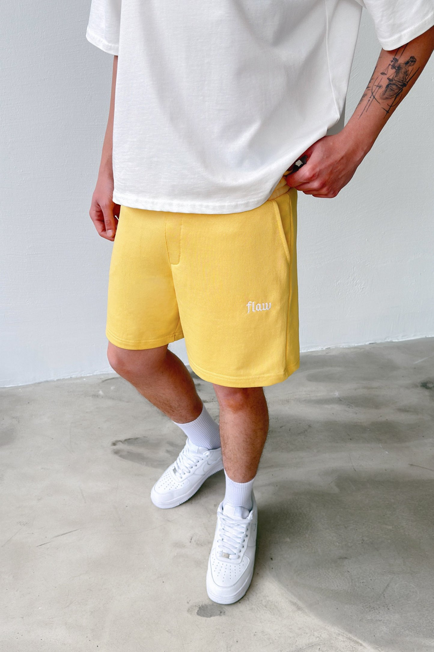 Flaw Embroidered Elastic Waist Shorts