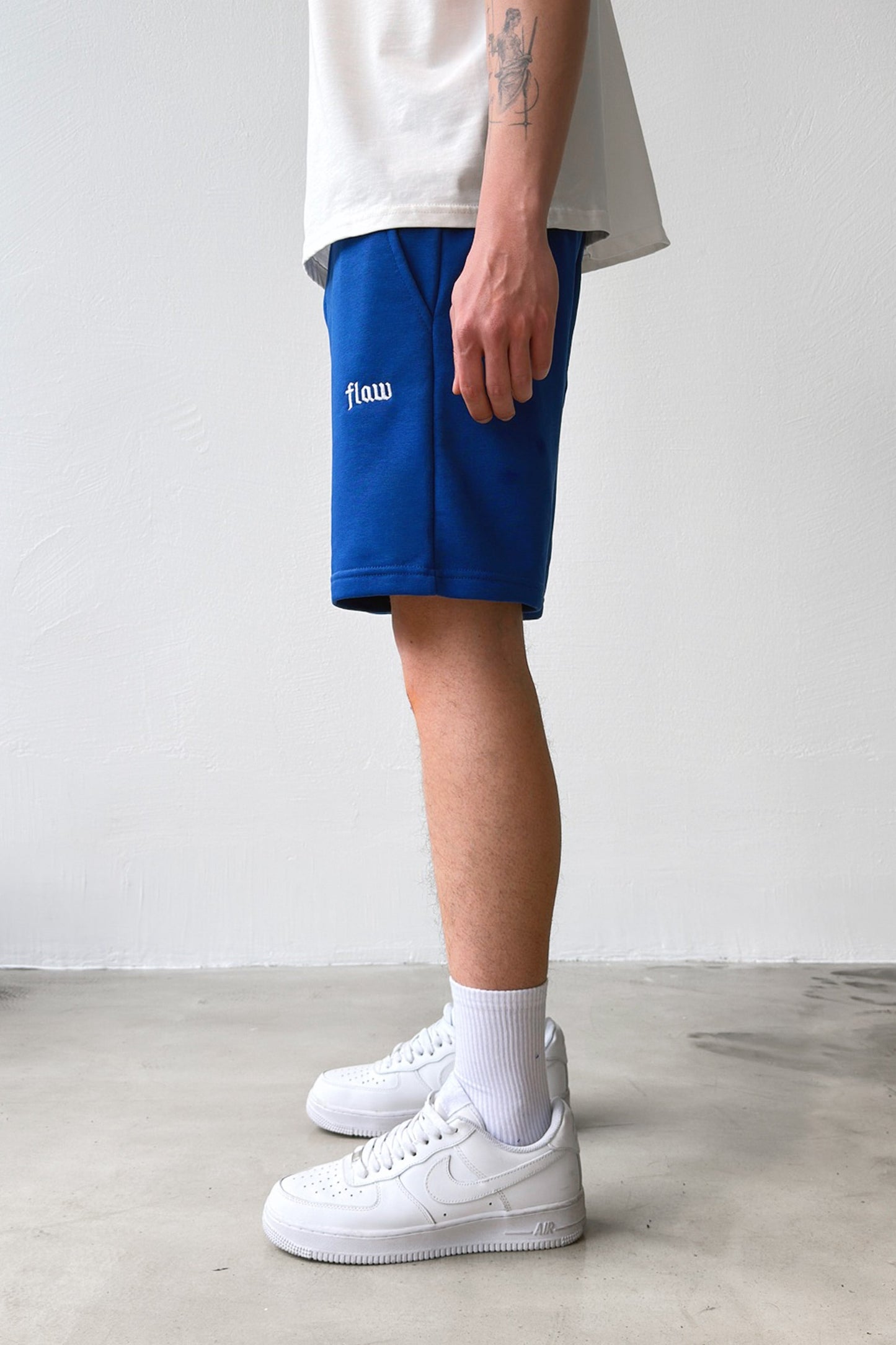 Flaw Embroidered Elastic Waist Shorts