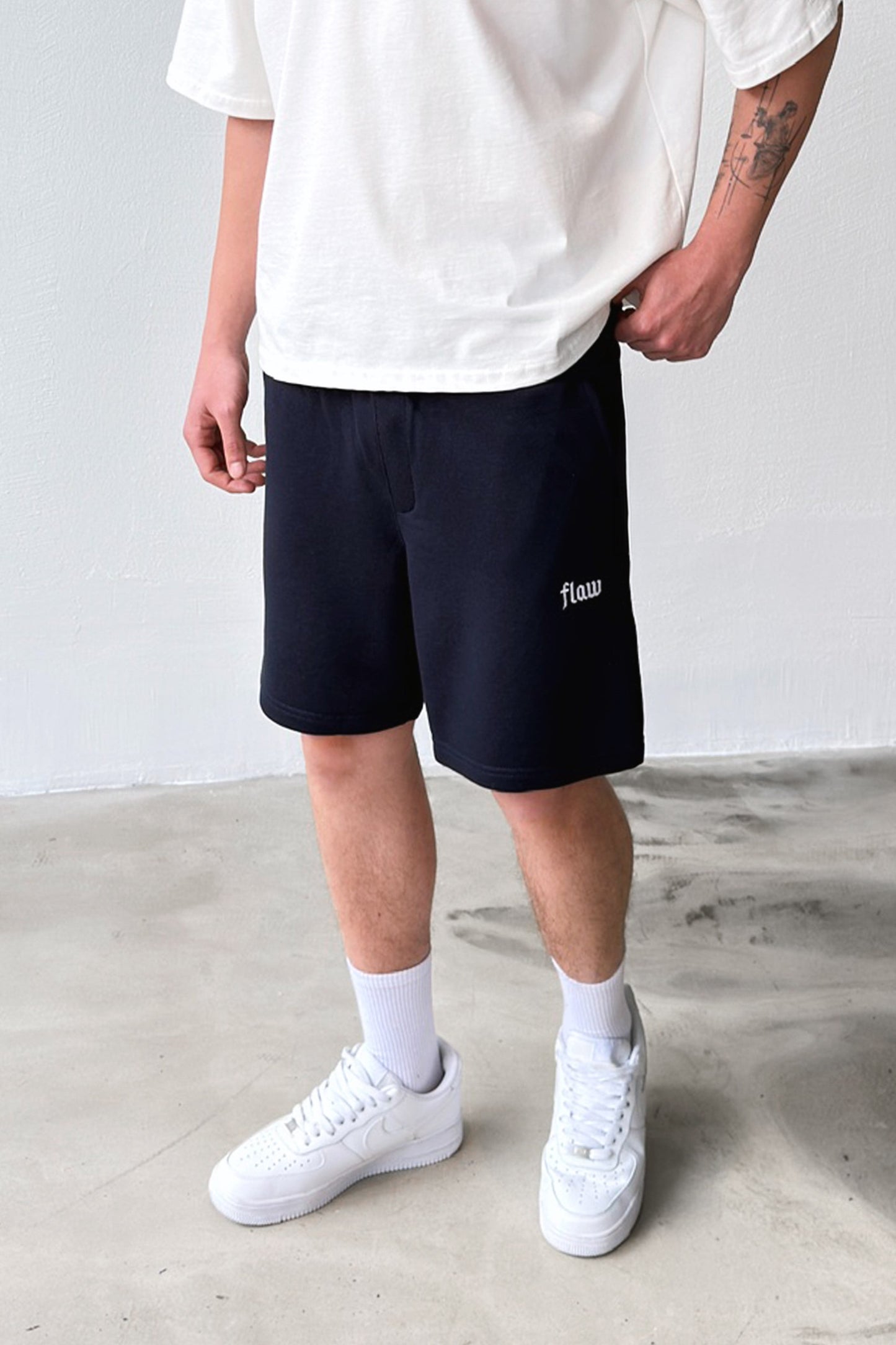 Flaw Embroidered Elastic Waist Shorts
