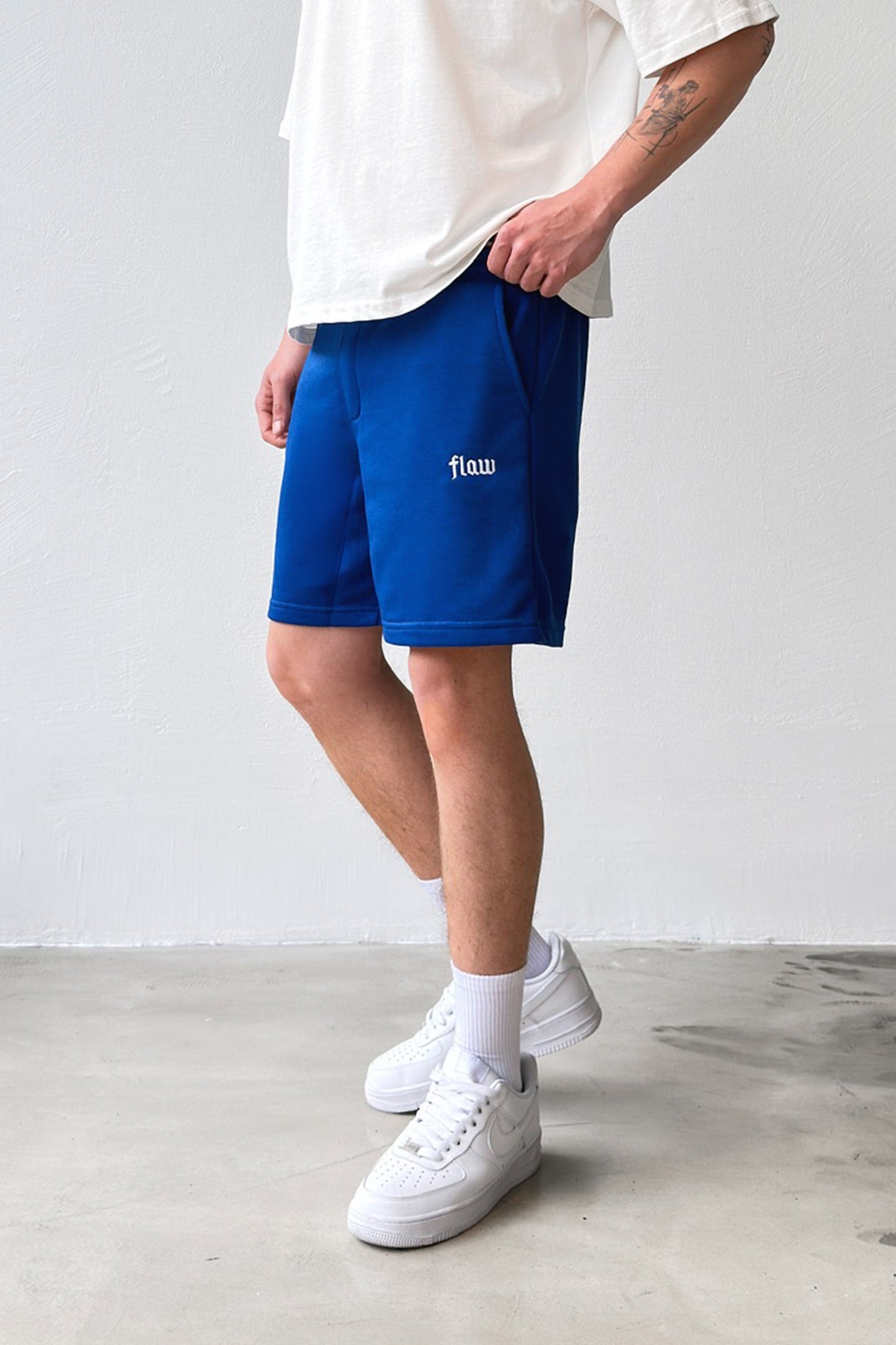 Flaw Embroidered Elastic Waist Shorts