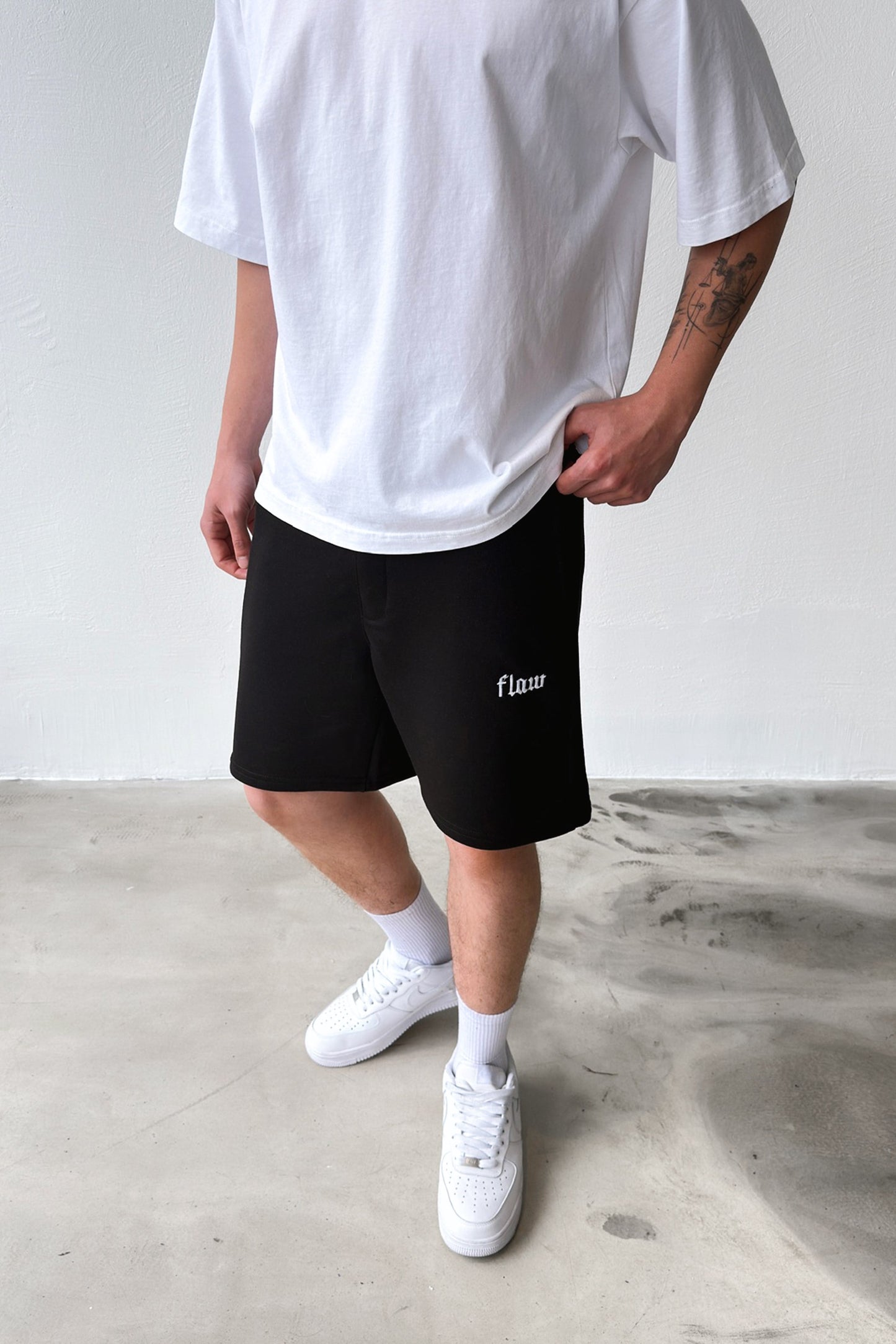 Flaw Embroidered Elastic Waist Shorts Black